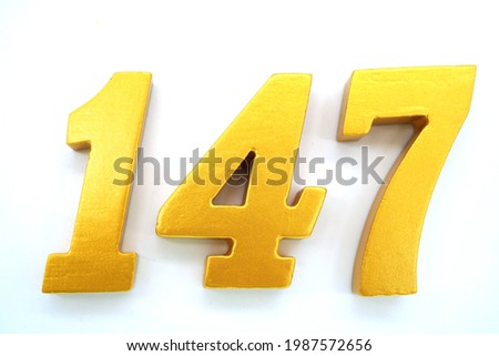  The letters are golden Arabic numerals on a white background.                              