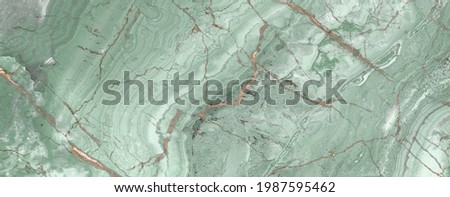 Spider aqua marble stone having a green backdrop with thin gold veins across the surface - forest green marble, Spider granite is applicability in wall décor, ceramic slab tile and ceramic surface.