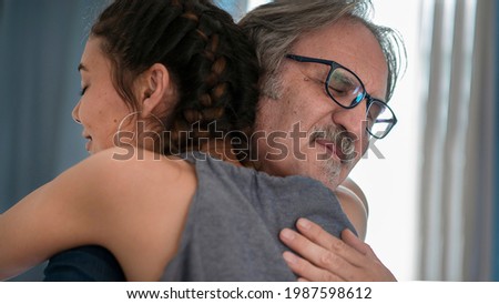 Daughter hugs his own father Royalty-Free Stock Photo #1987598612