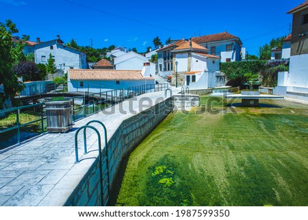 open air swimming pool in a portuguese village in summer