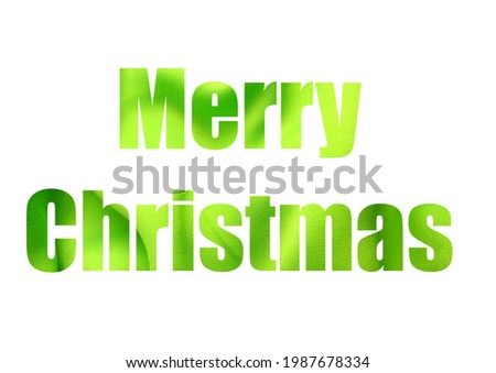 Green fabric texture background, Green fabric crumpled background. Shot through the cut-out silhouette of the word MERRY CHRISTMAS