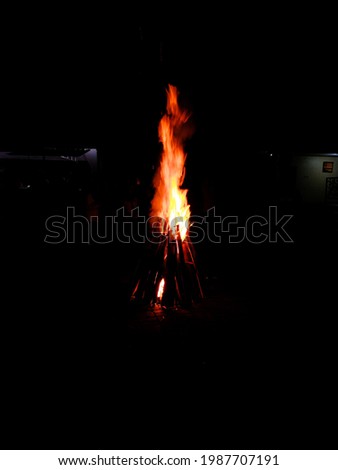 a picture of bonfire in the dark