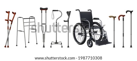 Realistic wheelchairs and canes. 3D medical supplies for musculoskeletal injury patients. Walking sticks set. Rehabilitation staffs and crutches. Vector props for handicapped persons Royalty-Free Stock Photo #1987710308