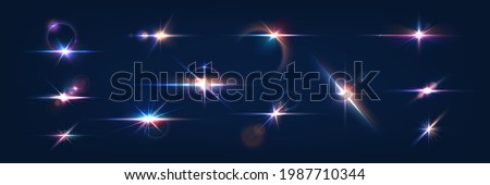 Flash. Realistic flares. Glowing effects. Photography camera light or sunlight reflection from lens. Stars in space. Isolated glints set. Sparkle glares. Vector shimmering elements Royalty-Free Stock Photo #1987710344