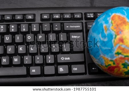 Globe on computer keyboard. Global computer business concept. World wide connection