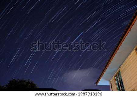 A star trail is a type of photograph that uses long exposure times to capture the apparent motion of stars in the night sky due to Earth's rotation.