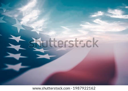 Celebrating Independence Day. United States of America USA flag over sunset sky, background for 4th of July
