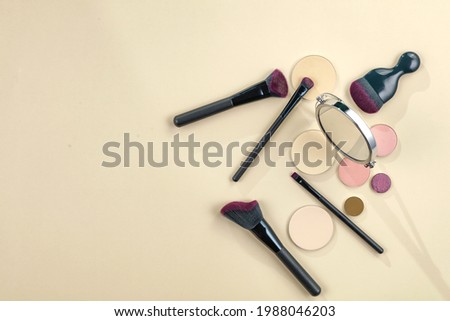 Cosmetic background of free space for your decoration and woman brushes. 