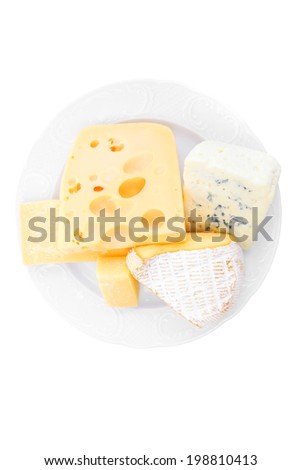 various types of cheese on white platter isolated on white background