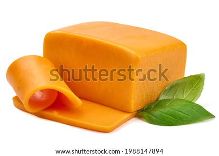 Piece of Cheddar cheese, isolated on white background. High resolution image. Royalty-Free Stock Photo #1988147894