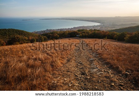 Beautiful landscape of the embankment beach near the sea of the tourist town on the background of the blue sky, Bulgaria, Europe