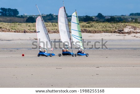 Sand yachting lessons on a beach in Finistère in Brittany. Royalty-Free Stock Photo #1988255168