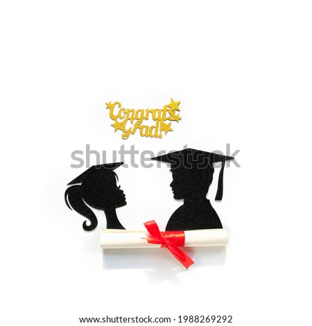 graduation background. paper silhouettes of graduate students and Graduation diploma isolated on white background. Degree day, Education concept. National Higher Education Day. flat lay