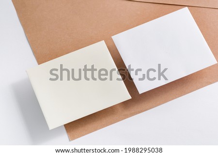 Two blank business cards on a duotone background. Template for branding identity.