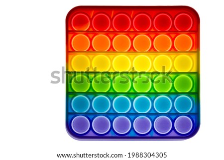 Toy antistress pop it isolated on white background. Copy space Royalty-Free Stock Photo #1988304305