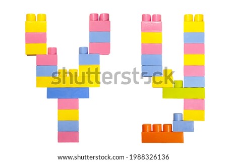 uppercase and lowercase "Y" of alphabet made of colorful blocks of the toy designer isolated on the white background