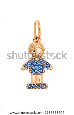 Gold pendant boy. The jewelry is isolated on a white background. Expensive jewelry, precious diamond