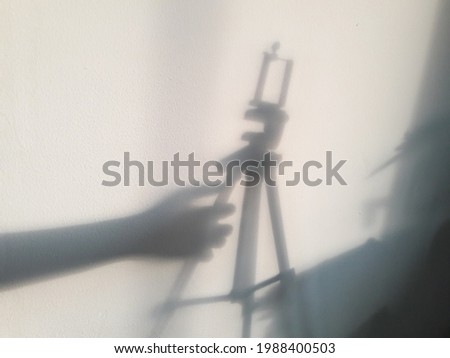 hand shadow photo with wall background