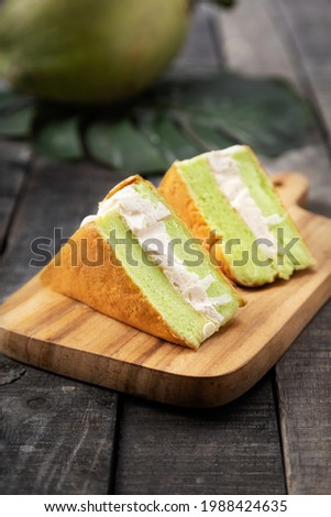 Coconut Chiffon Cake, panda flavor on wooden background