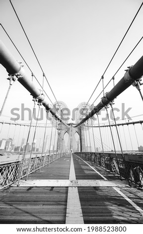 Black and white picture of Brooklyn Bridge, New York City, USA.