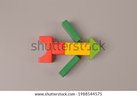 Children's educational toys rocket shape on a grey background. The concept of education and child development