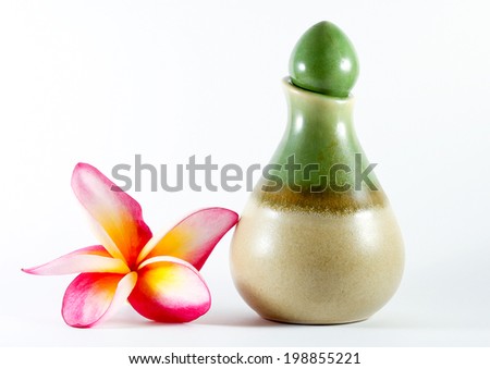 small green bottles with flowers