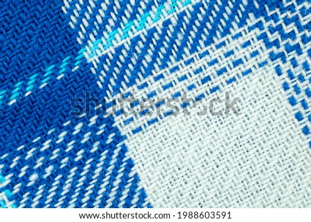 Blue fabric texture and pattern background, cotton checkred textile cloth close up photo with high resolution