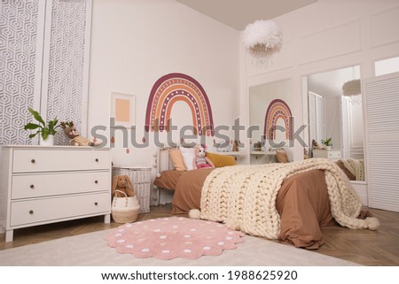 Stylish room with comfortable bed for kids. Interior design