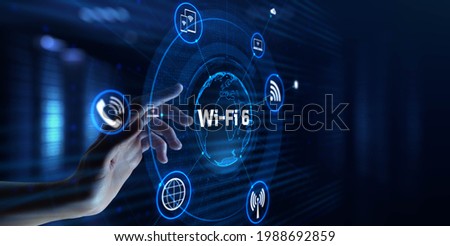 Wifi 6 Wireless internet connection network technology concept. Hand pressing button on virtual screen. Royalty-Free Stock Photo #1988692859