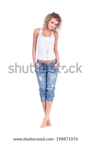 full length picture of a casual young woman standing, isolated on white background