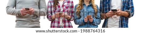 The four people with phones stand on the white wall background