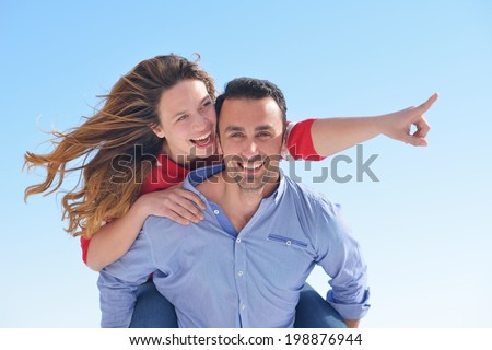 happy young romantic couple have fun relax smile at modern home indoor and outdoor
