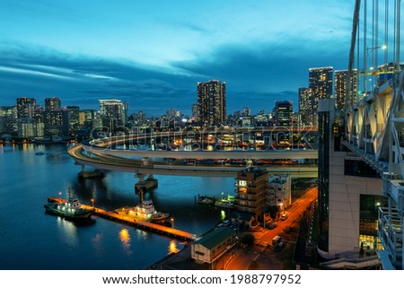 Beautiful landscape of architecture of famous modern district Tokyo with bridge, road and sea, Japan travel background
