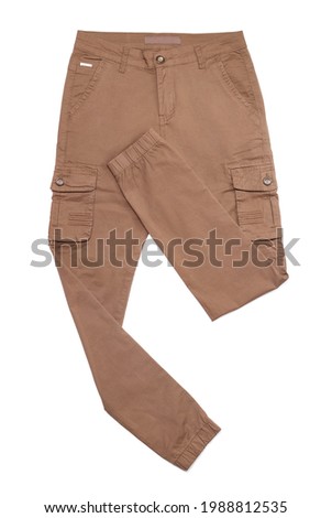 Top view of brown male cargo pants or trousers isolated on white background.