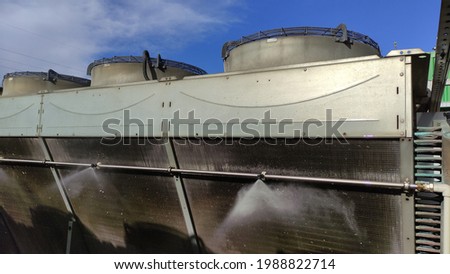 Cooling system for industrial heat exchangers. Industrial fan cooling tower. Water spray nozzle close up