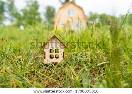 layout of a house on the grass, the concept of eco-friendly housing