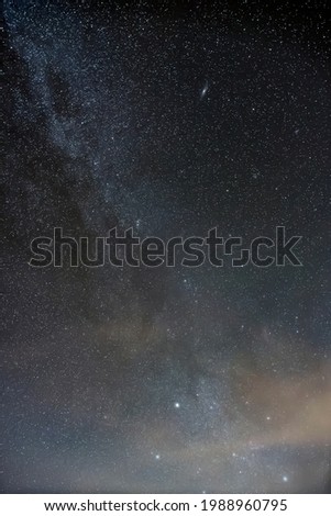 Milky Way with Andromeda Galaxy in the night sky.