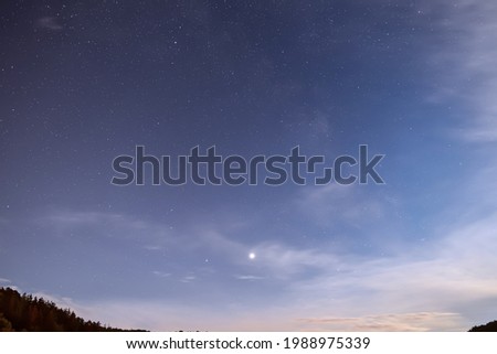 Saturn and Jupiter in the night sky.