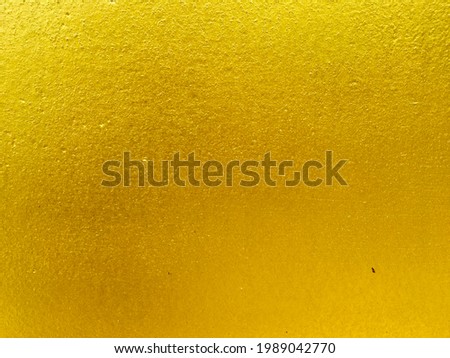 Yellow golden wallpaper texture for background 