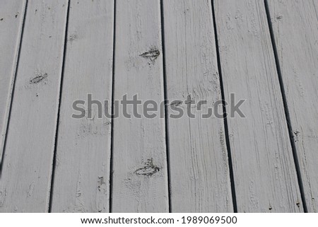 Texture of wooden boards painted gray