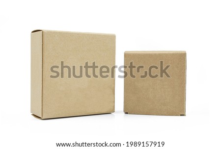 Two closed carboard boxes isolated on white background. 
Blank, carton made packages Royalty-Free Stock Photo #1989157919