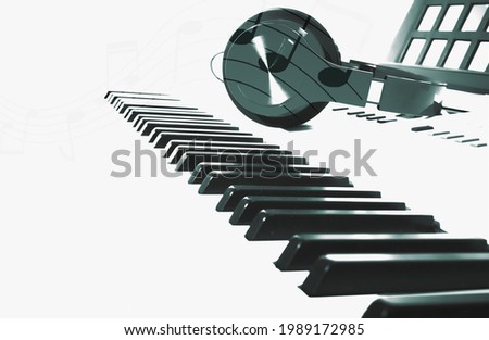 Soft focus of a modern piano keys and headphones with copy space and white backgroud