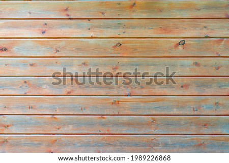 Old wooden planks with peeling paint. Vintage wood texture. 