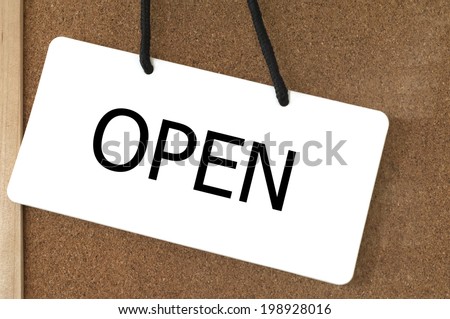 Open sign label on wooden board. 