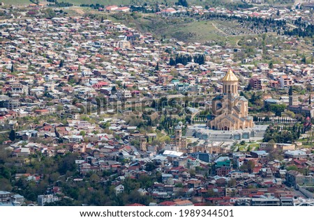 A picture of the Sameba Cathedral as seen from a vantage point.