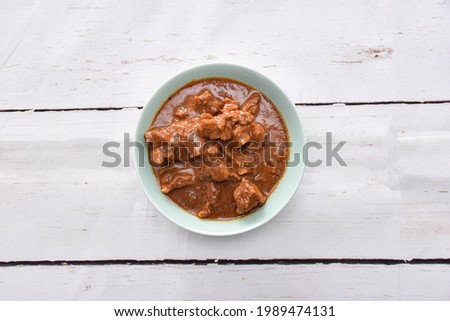 Chicken tikka (hubbard )  masala traditional Indian, Sri Lankan Asian spicy meat food with curry chicken, on the color dish with white background