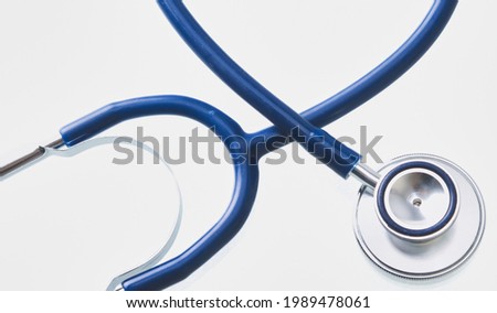 A medical stethoscope in the form of a heart isolated on white background