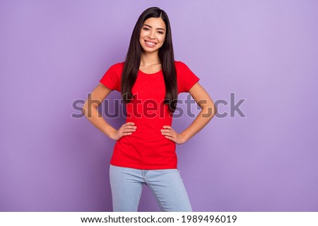 Photo of sweet confident young lady wear red outfit arms waist smiling isolated violet color background