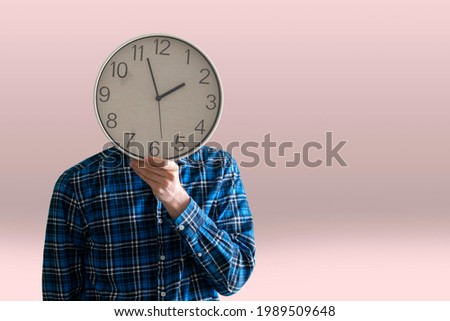 time management concept, employee person holding a clock 