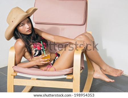 young woman resting with juice